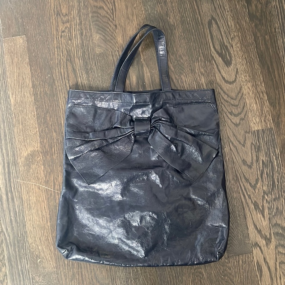 Red Valentino navy tote with a bow.